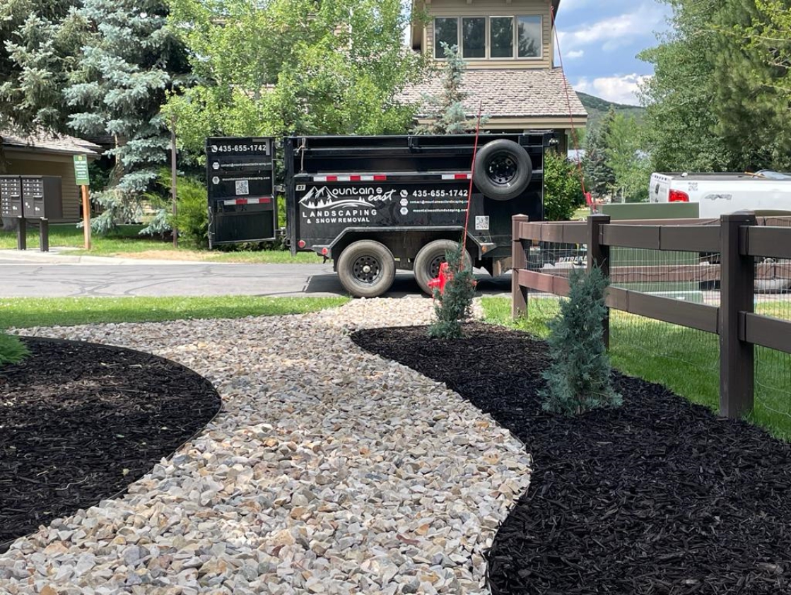 Backyard patio and retaining wall landscaping